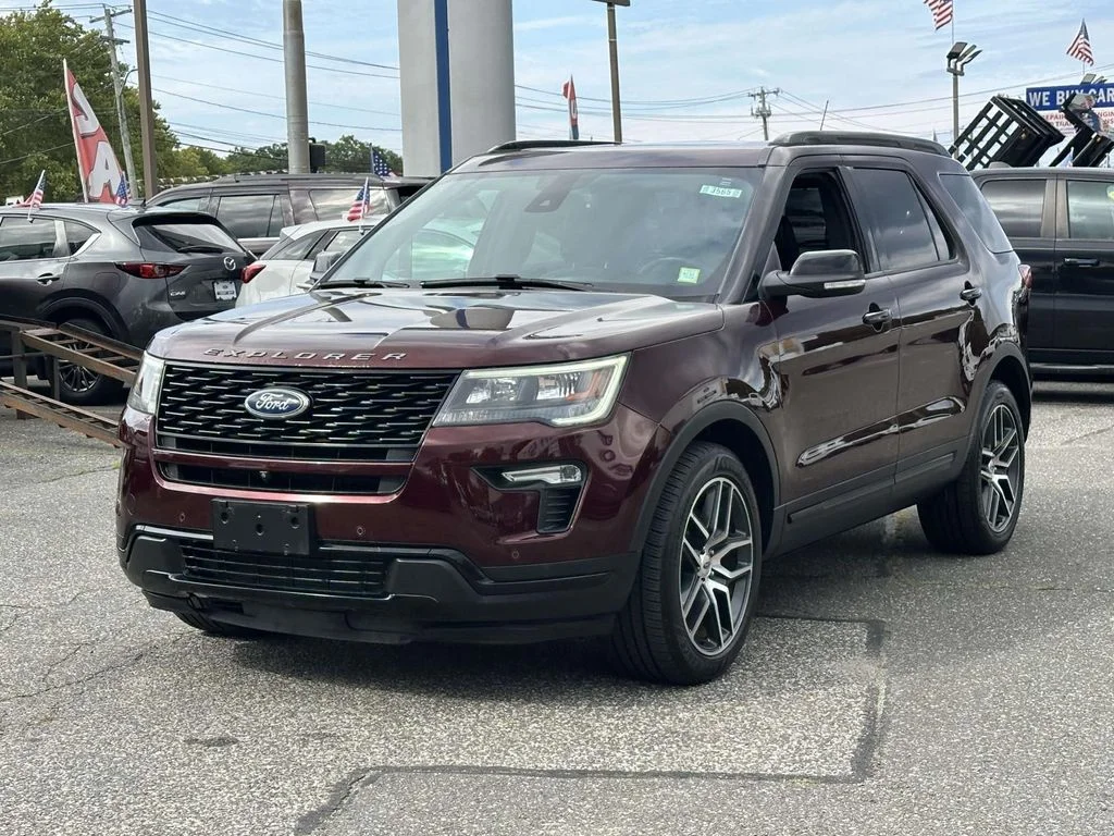 Used 2018 Burgundy Ford Sport image 1