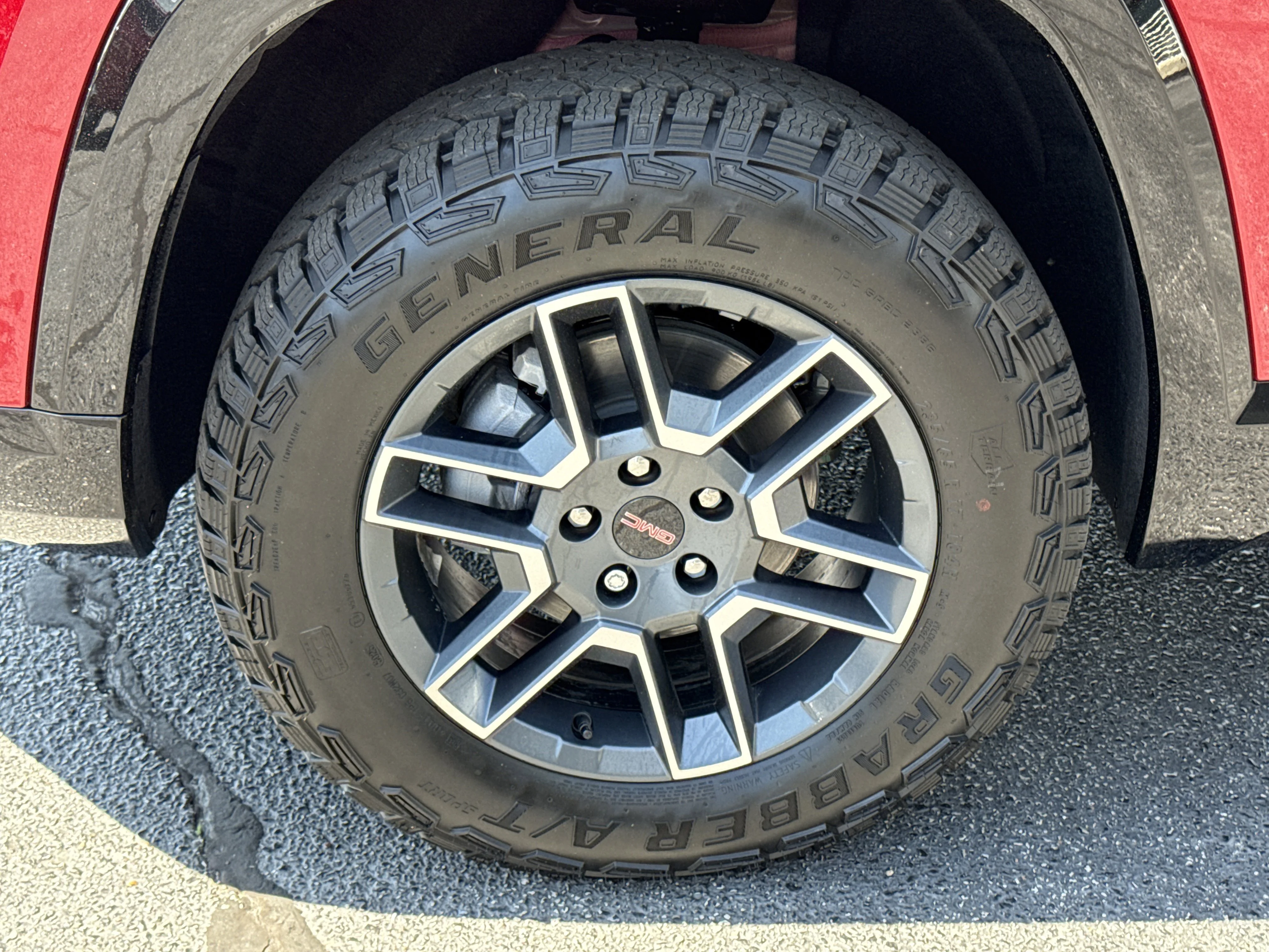 New 2026 Volcanic Red Tintcoat GMC AWD AT4 image 14