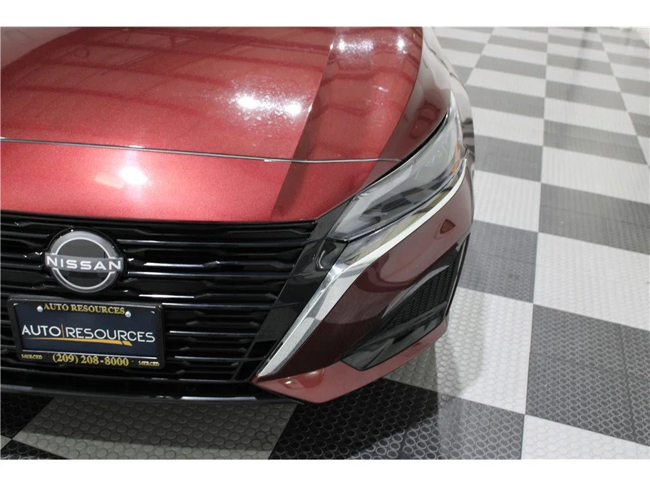 Used 2025 Garnet Pearl Metallic Nissan SV image 8