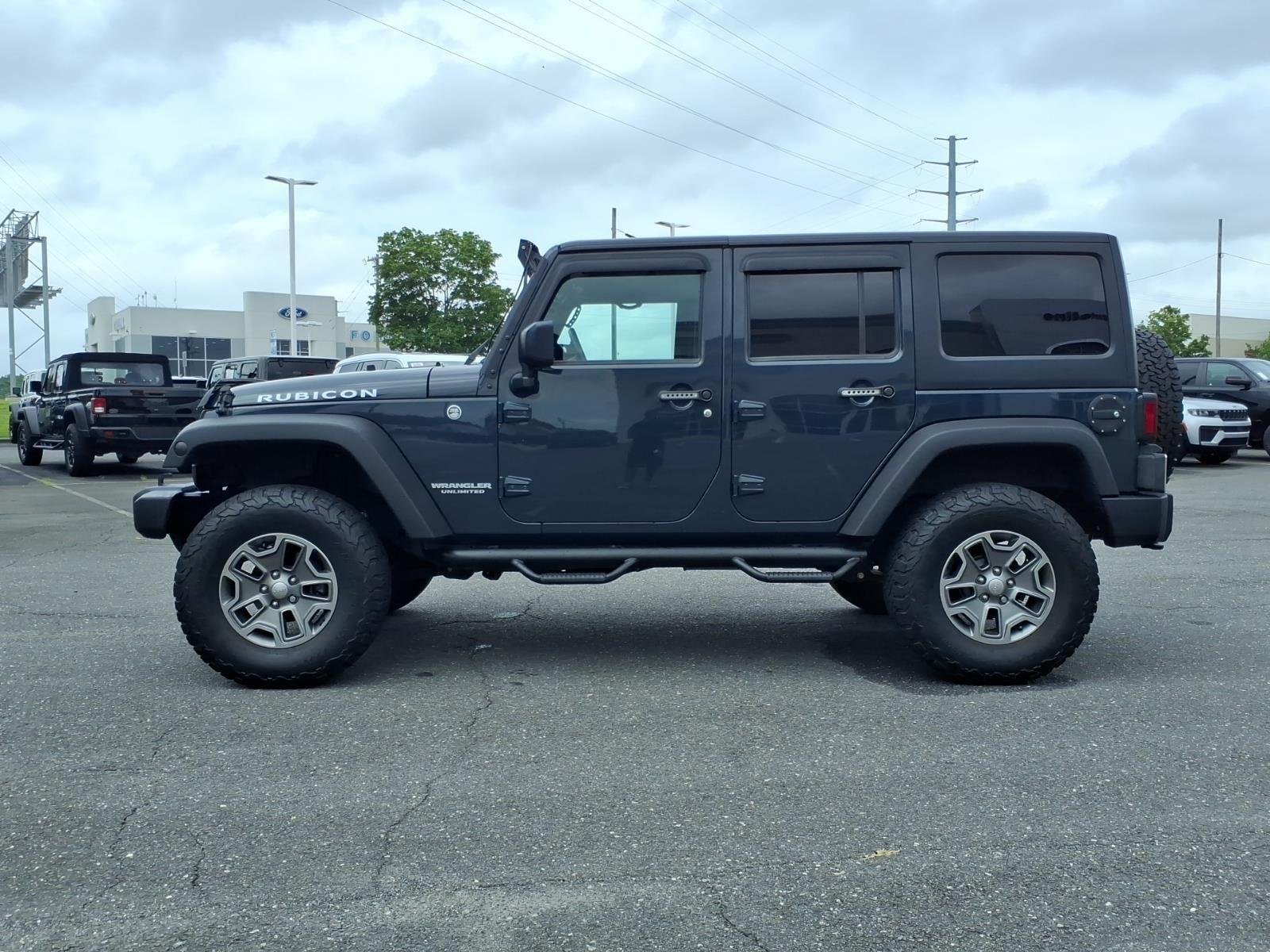 Used 2017 Granite Crystal Metallic Clearcoat Jeep Rubicon image 3