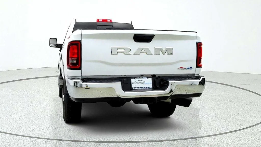 Used 2025 Bright White Clearcoat Ram Tradesman 4x4 Crew Cab 6