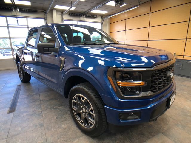 Used 2025 Blue Metallic Ford STX image 1