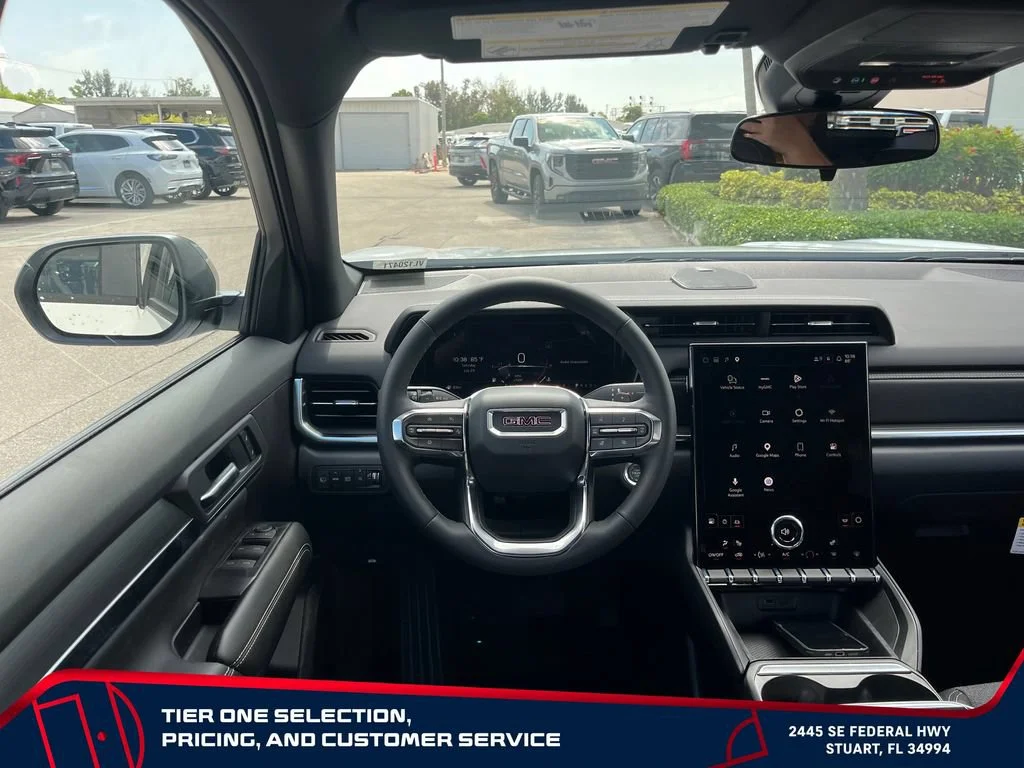 New 2027 Summit White GMC FWD Elevation image 24