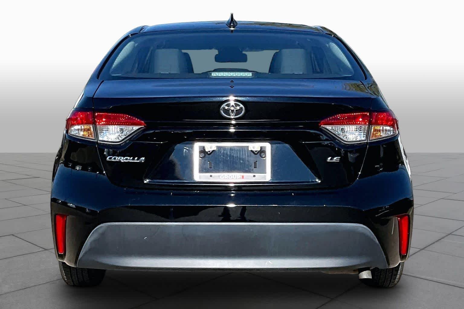 Used 2025 Midnight Black Metallic Toyota LE image 5