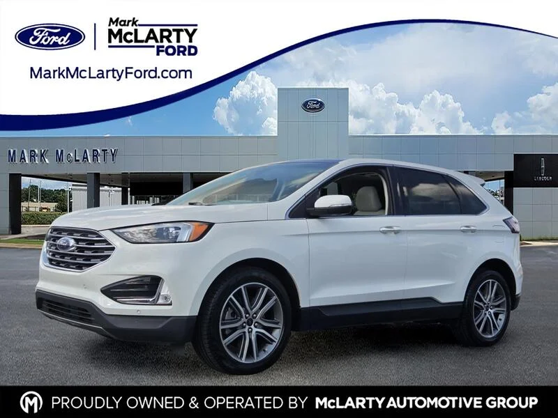 Used 2023 White Metallic FORD TITANIUM AWD image 1