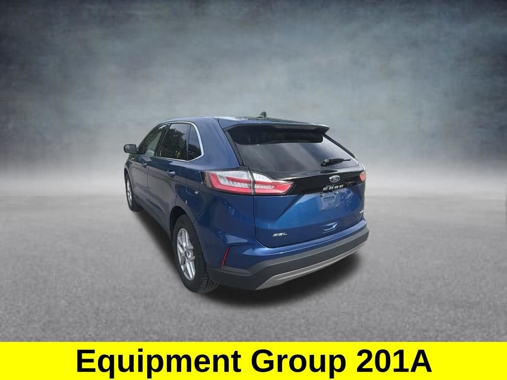 Certified Used 2024 Blue Metallic Ford SEL image 3