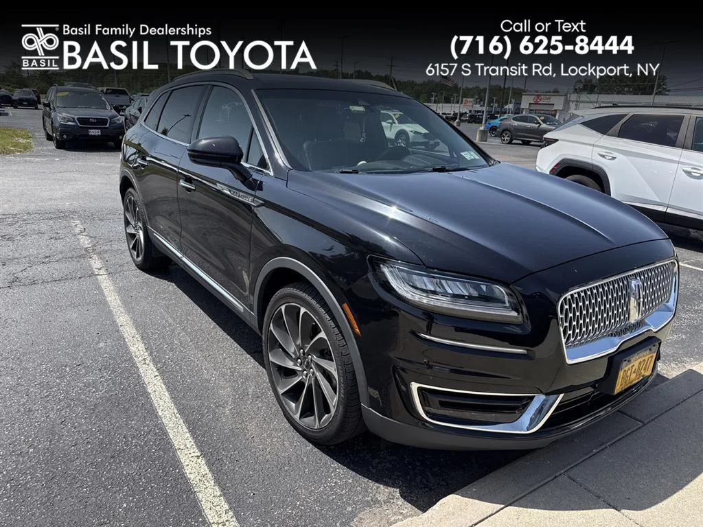 Used 2019 Infinite Black Metallic Lincoln Reserve image 1