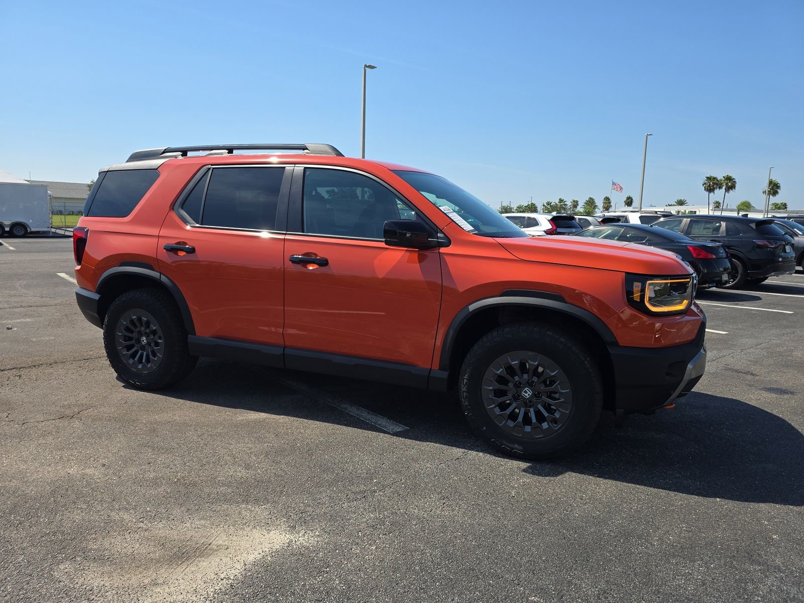 New 2026 Sunset Orange Honda TrailSport image 2