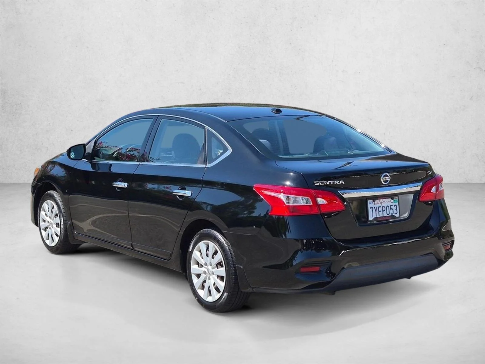 Used 2017 Super Black Nissan SV image 8