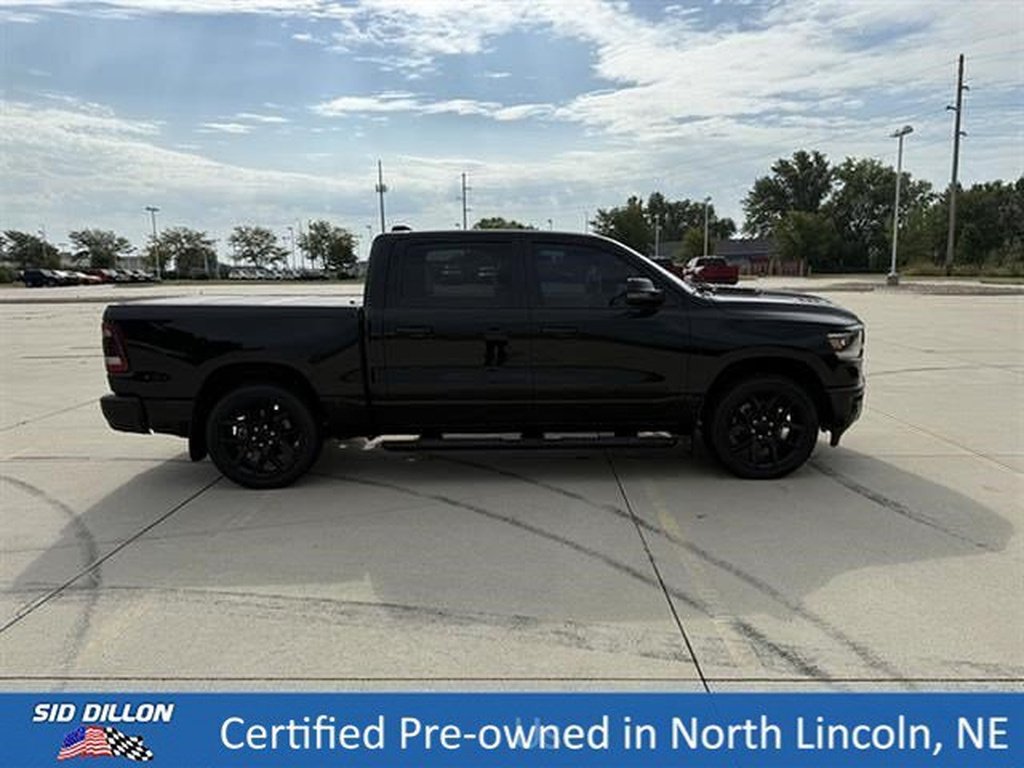 Used 2023 Diamond Black Crystal Pearl Coat Ram Laramie image 3