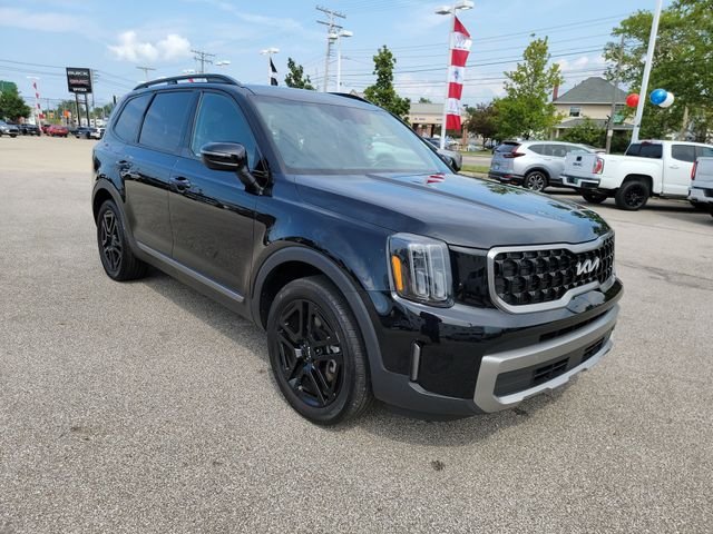 Used 2023 Ebony Black Kia EX X-Line image 11