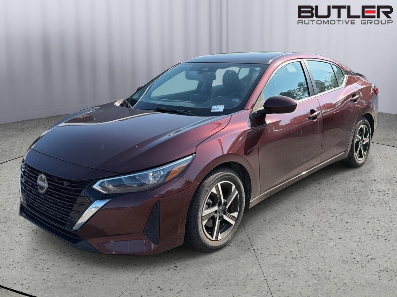 Used 2024 Rosewood Metallic Nissan SV image 1