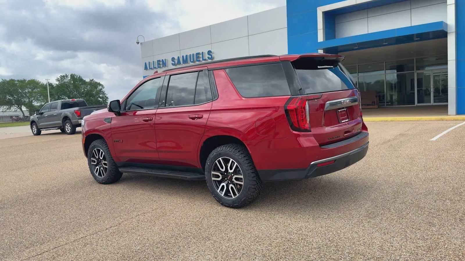 Used 2024 Volcanic Red Tintcoat GMC AT4 image 6