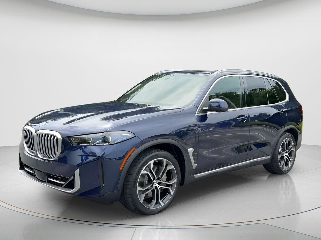 New 2026 Tanzanite Blue II Metallic BMW xDrive50e image 1