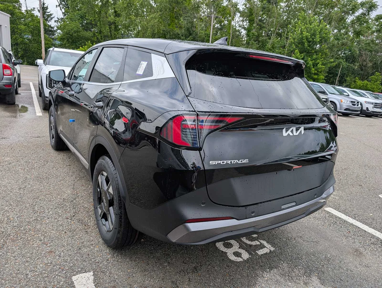 New 2026 Ebony Black Kia LX image 9