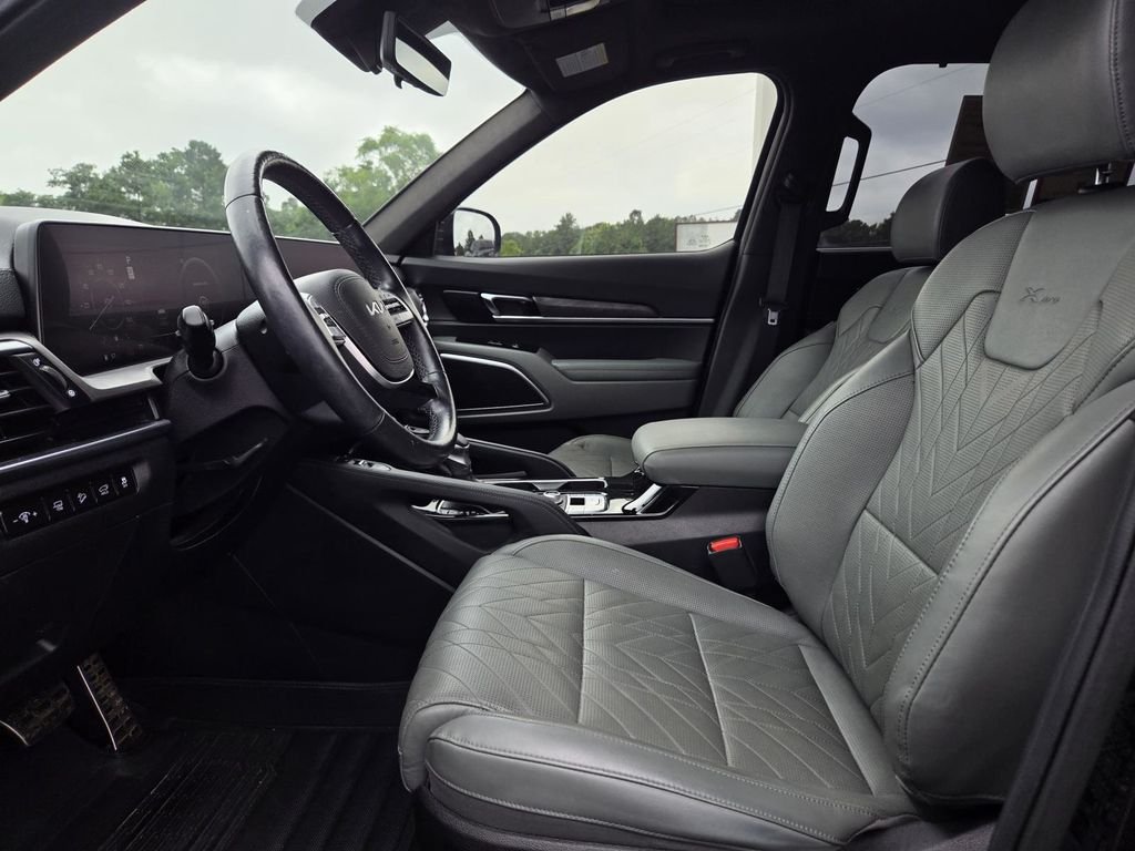 Used 2023 Ebony Black Kia SX-Prestige X-Pro image 13