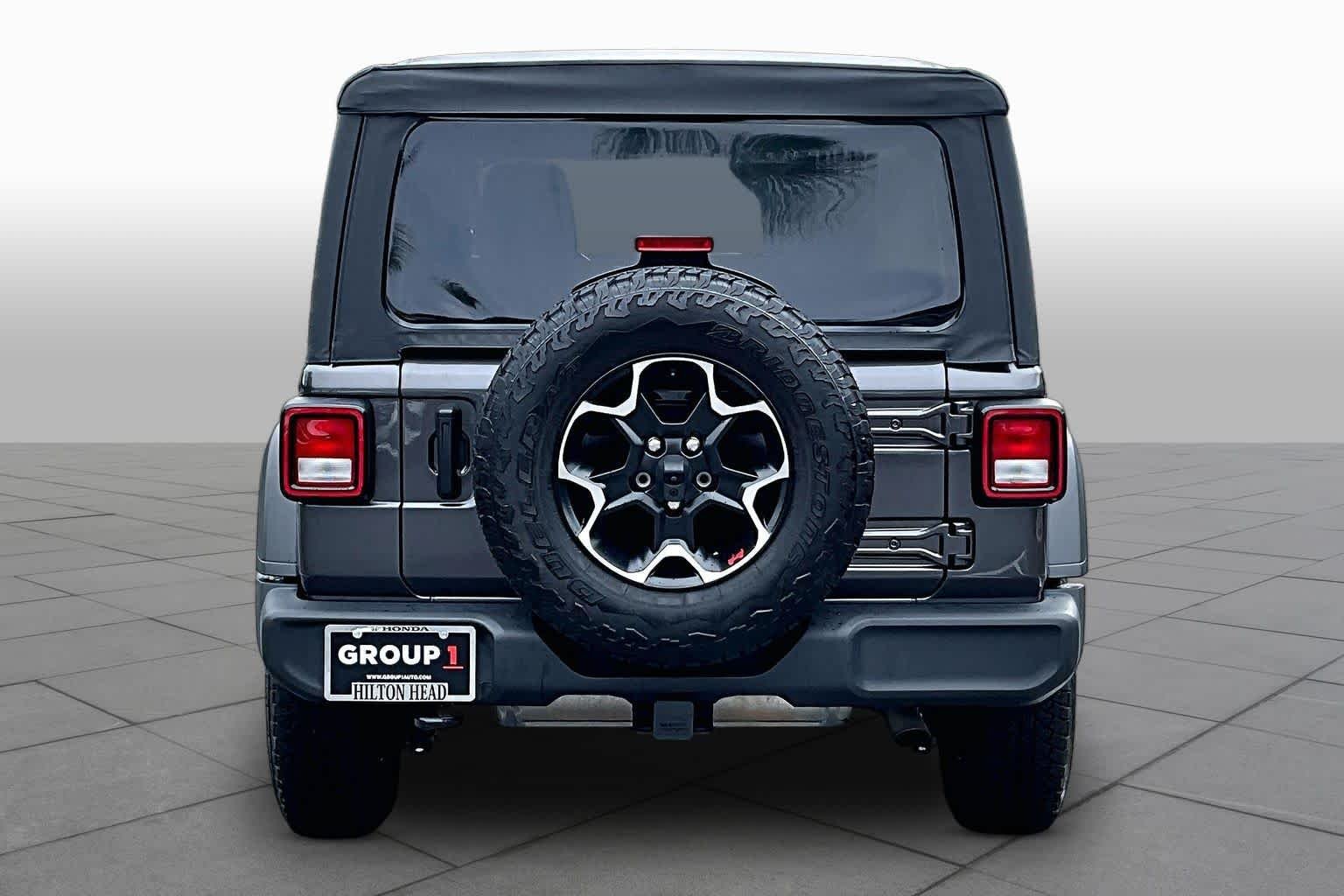 Used 2021 Granite Crystal Metallic Clearcoat Jeep Unlimited Sport S image 5
