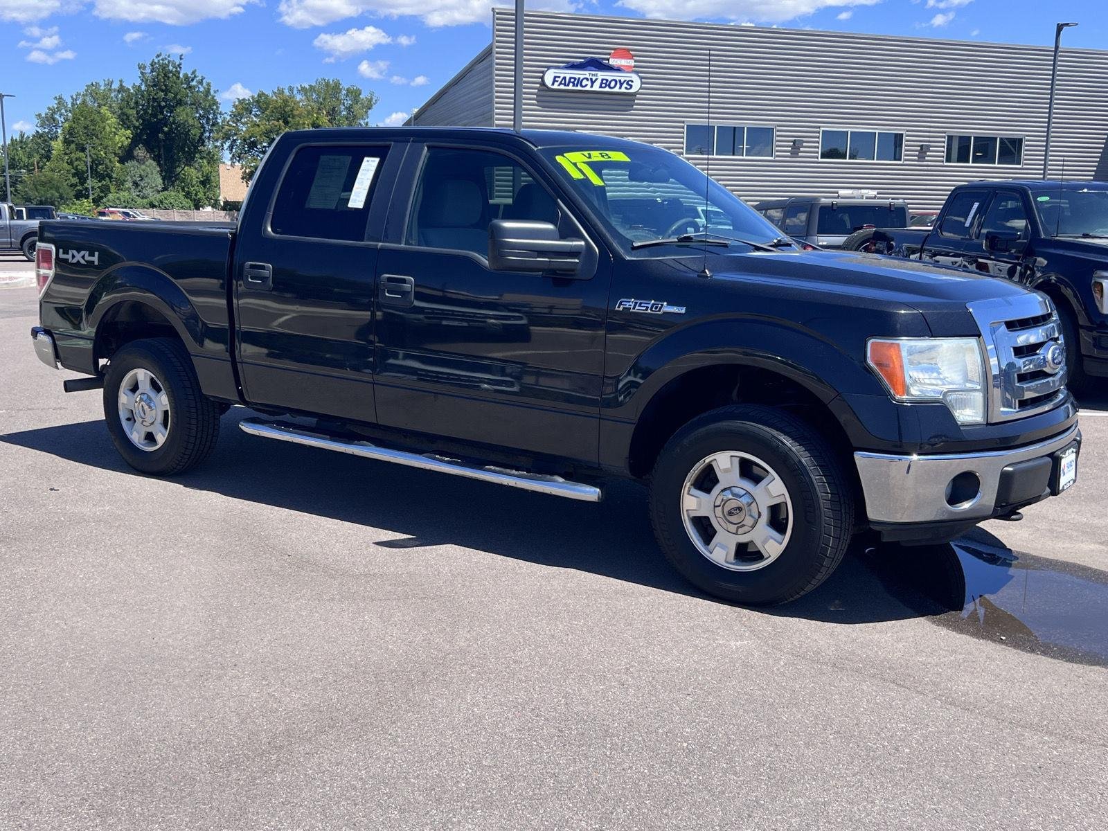 Used 2011 Tuxedo Black Metallic Ford XLT image 3