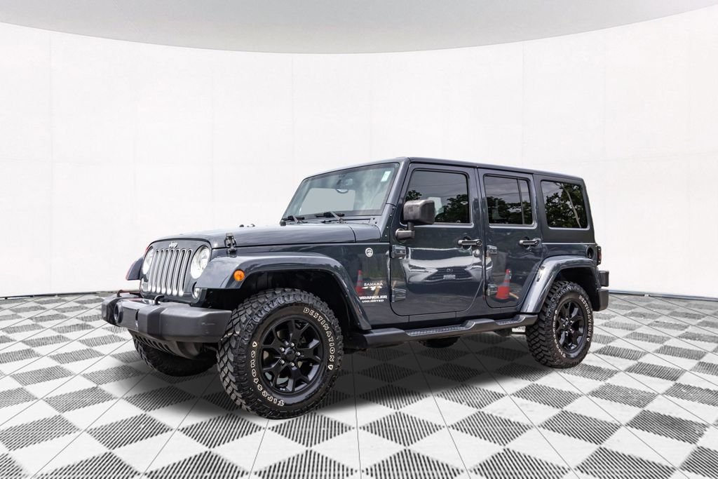 Used 2017 Black Jeep Unlimited Sahara image 6