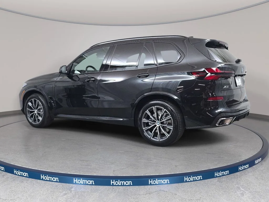Used 2026 Black Sapphire Metallic BMW xDrive50e image 8