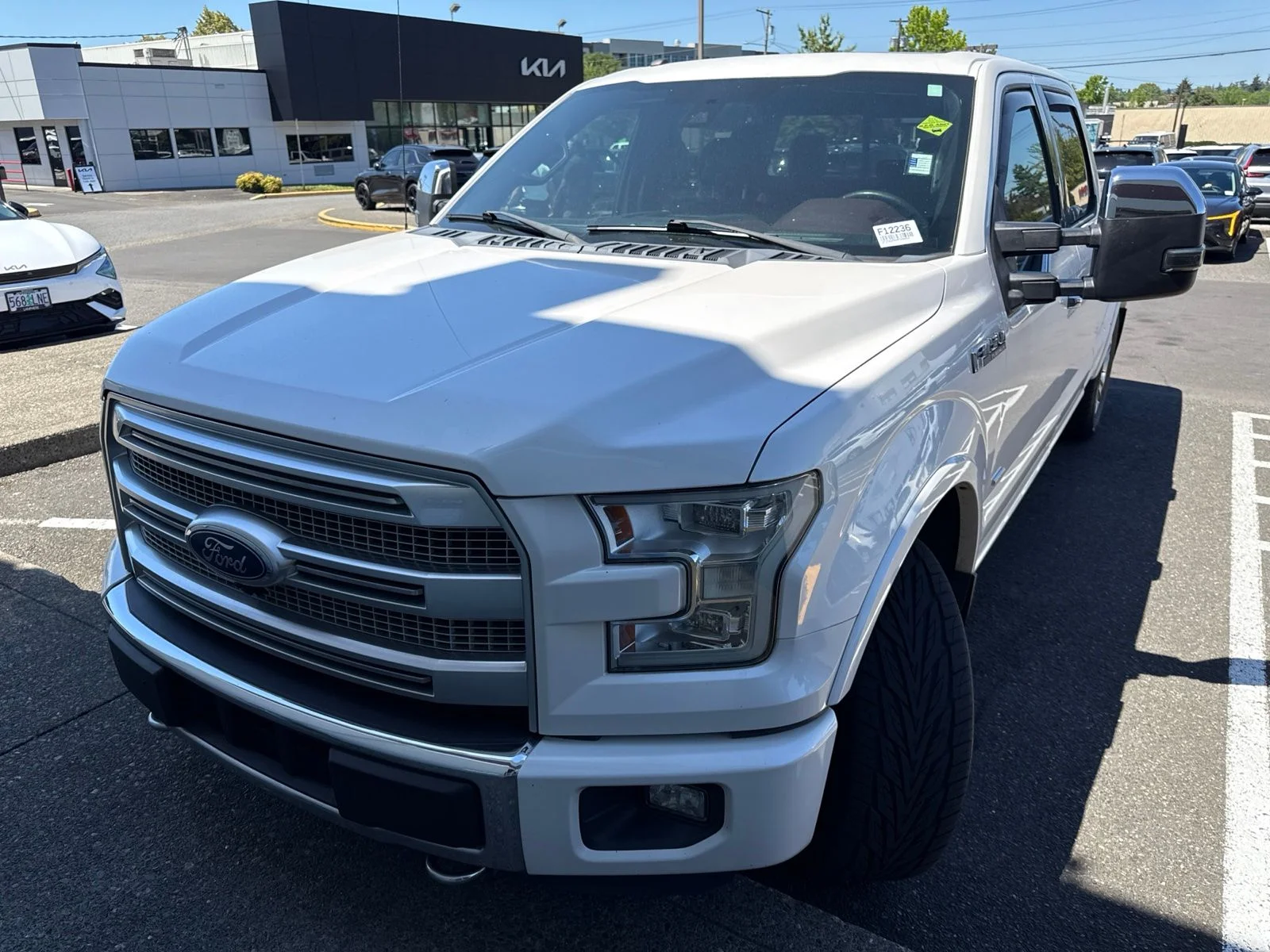 Used 2016 White Platinum Metallic Tri-Coat Ford Platinum image 1
