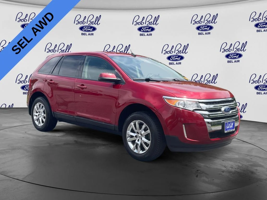 Used 2014 Ruby Red Metallic Tinted Clearcoat Ford SEL image 1