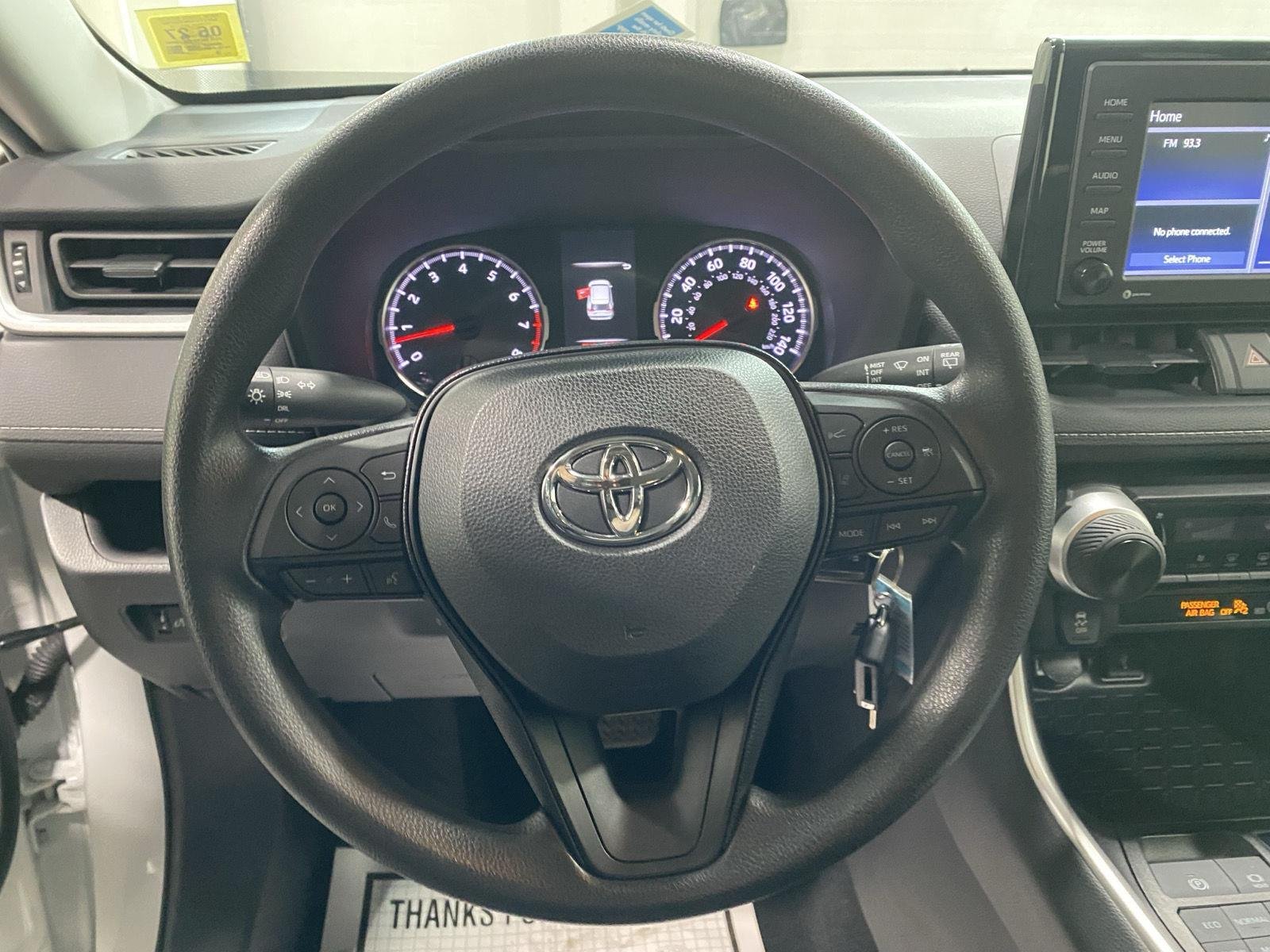 Used 2021 Super White Toyota LE image 19
