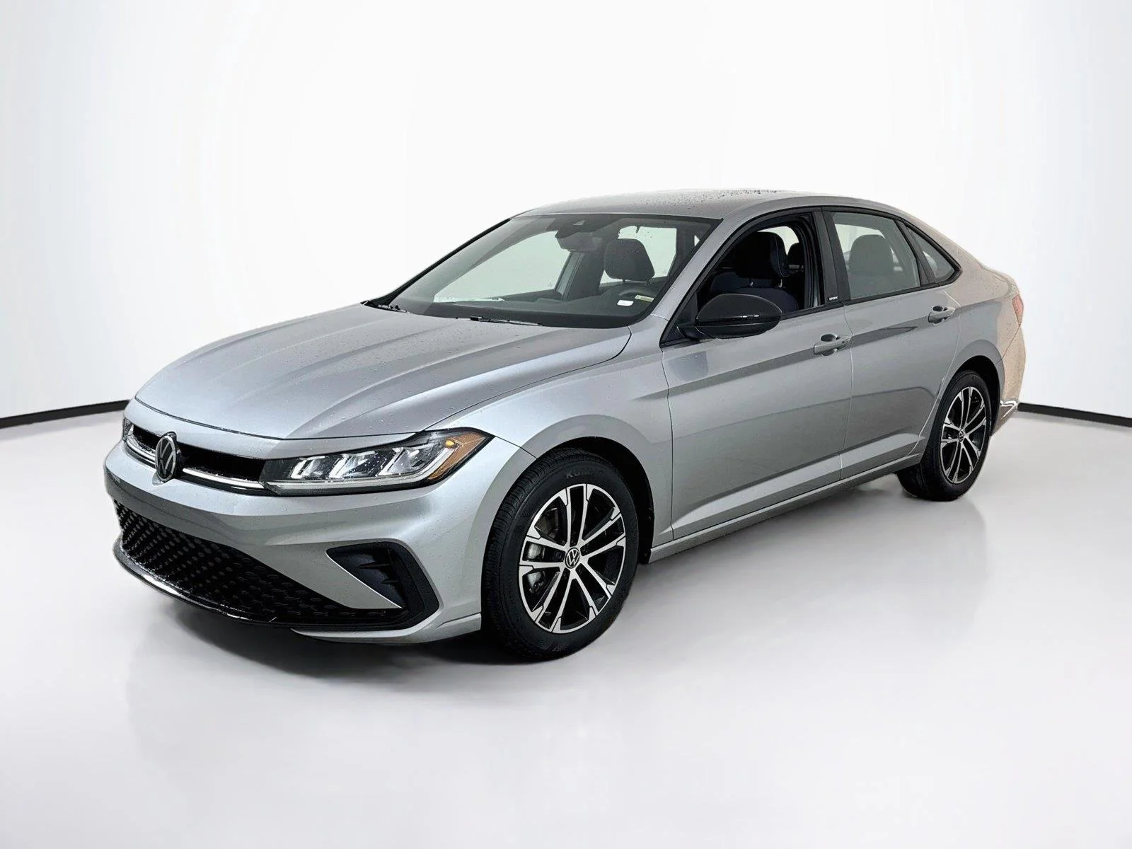 New 2027 Pyrite Silver Metallic Volkswagen Sport image 1