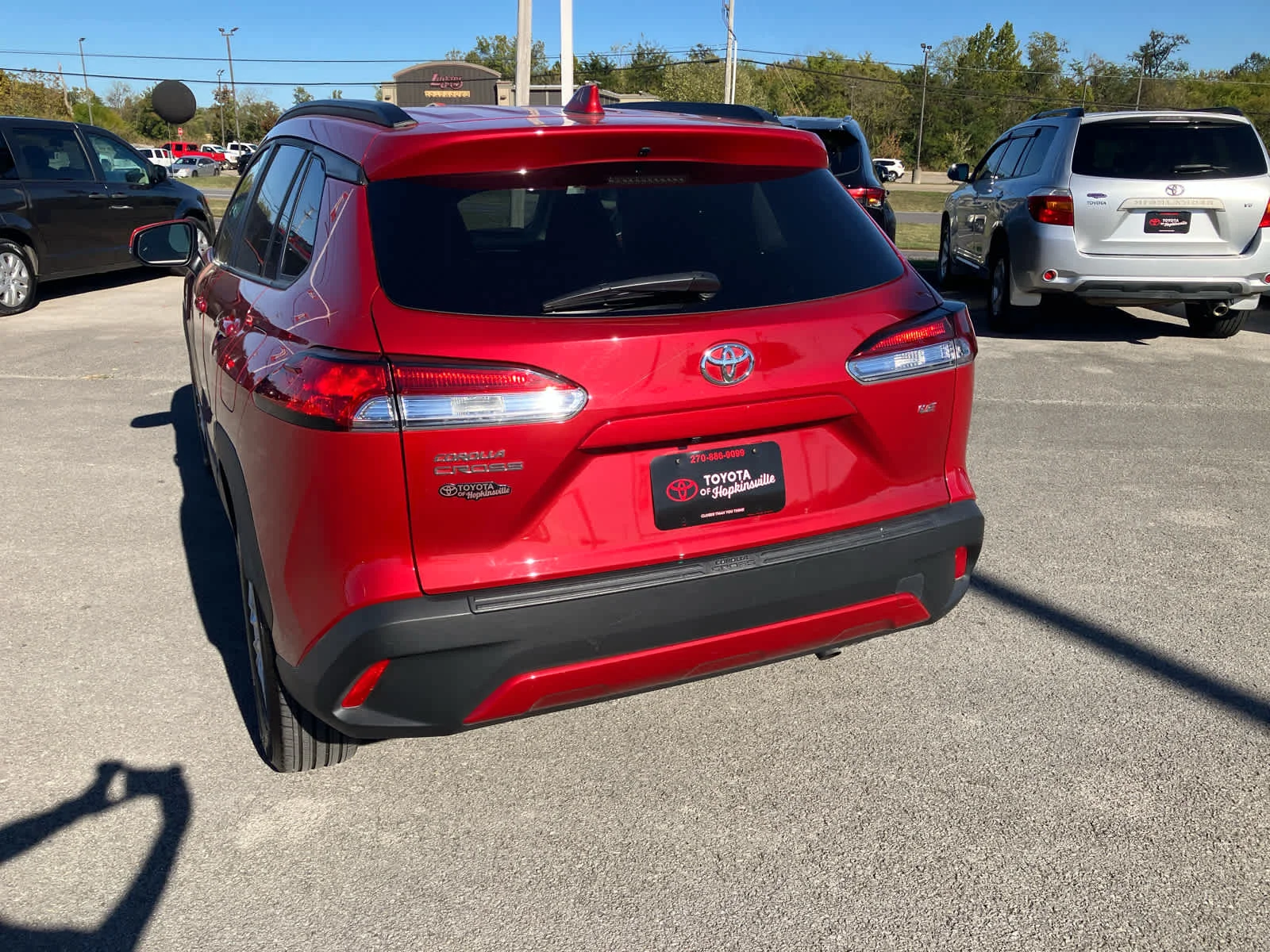 Used 2023 Barcelona Red Metallic Toyota LE image 6