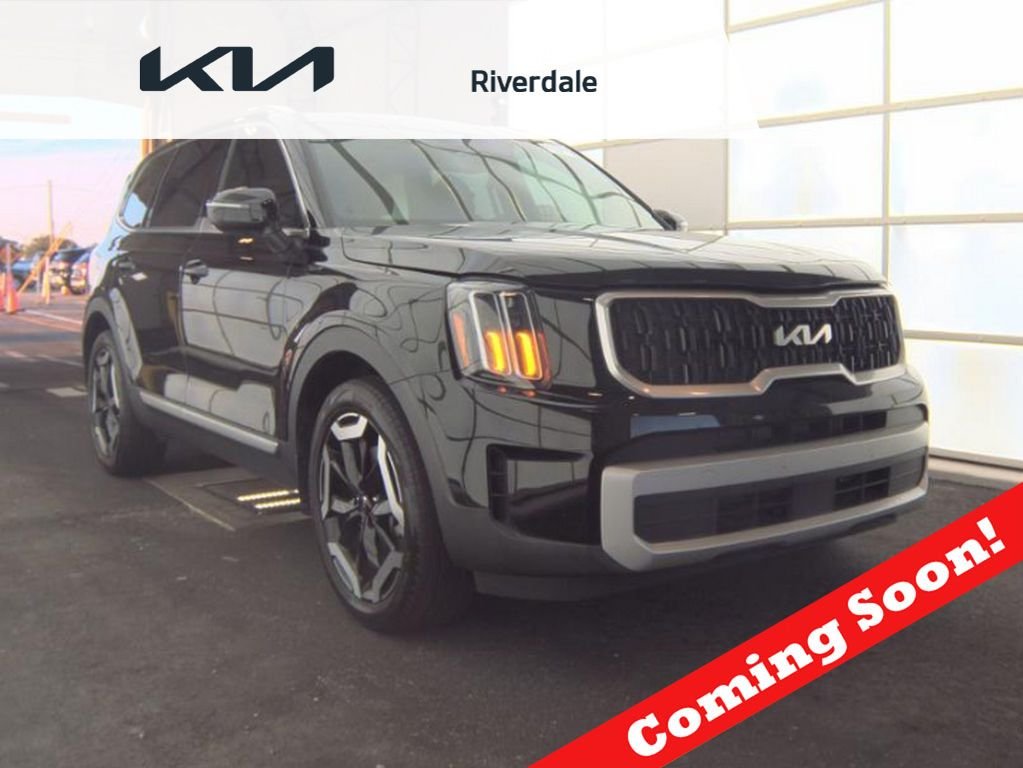 Used 2025 Black Kia EX image 1