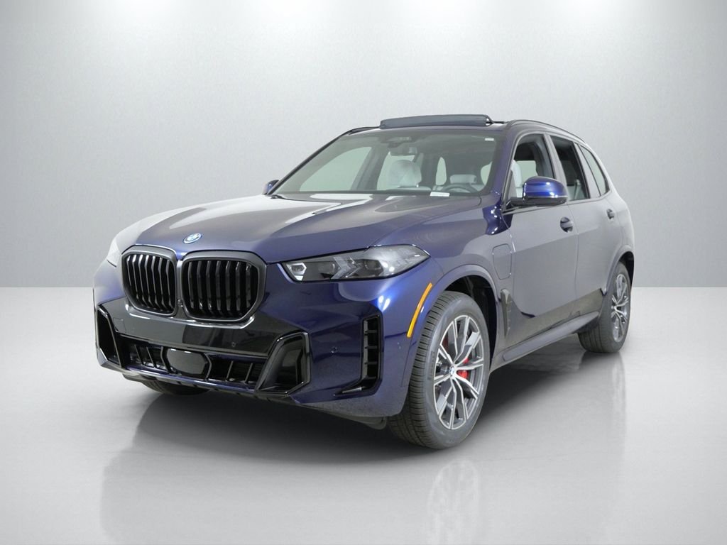 New 2026 Tanzanite Blue II Metallic BMW xDrive50e image 1