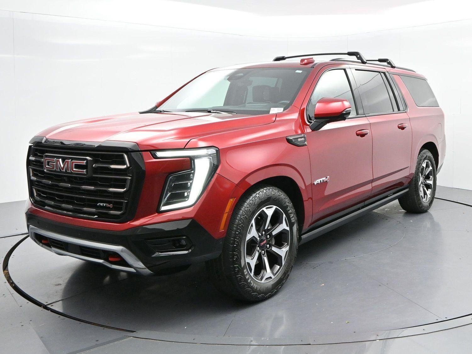Used 2025 Volcanic Red Tintcoat GMC AT4 Ultimate image 3