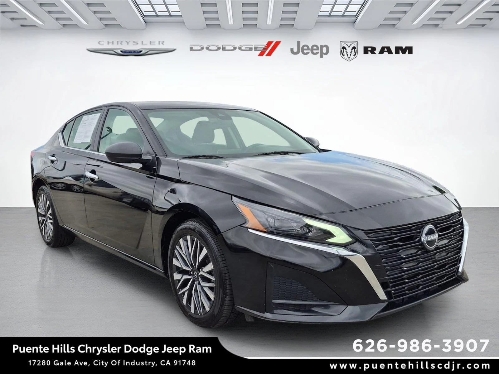 Used 2025 Super Black Nissan SV image 1