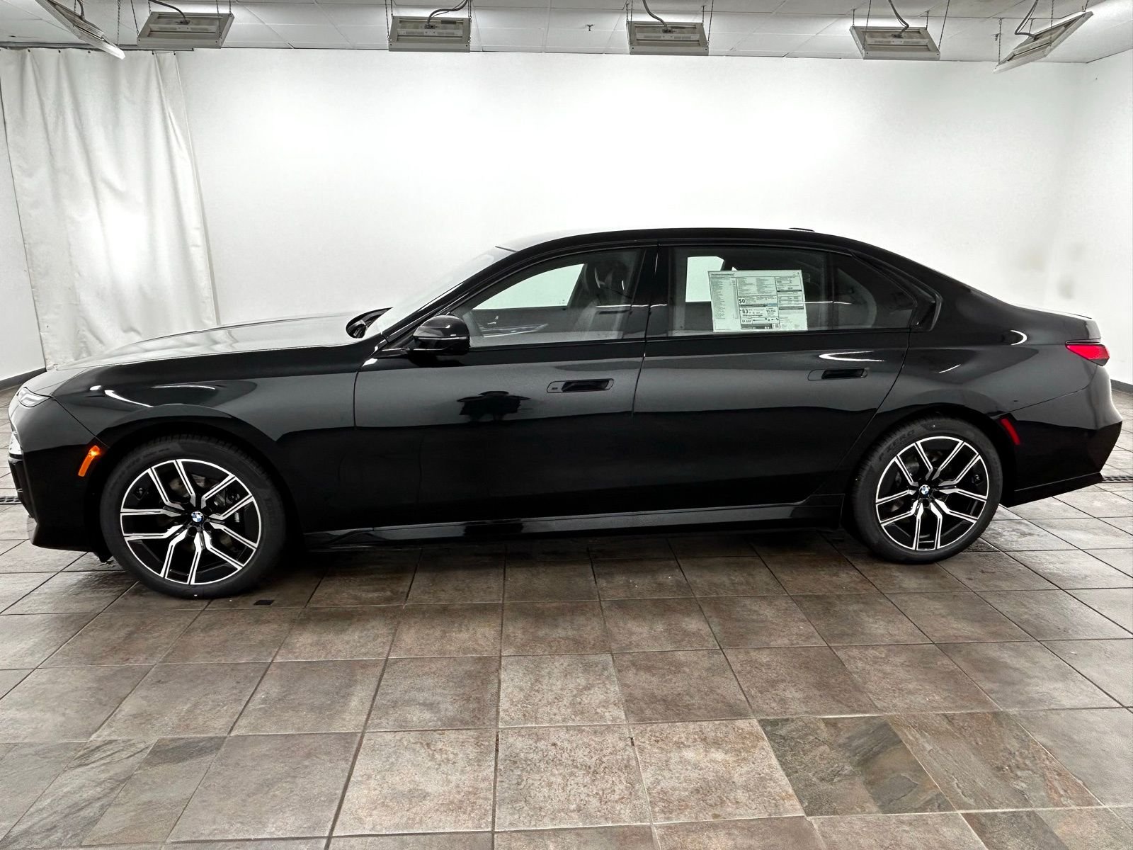 New 2026 Black Sapphire Metallic BMW xDrive60 image 2