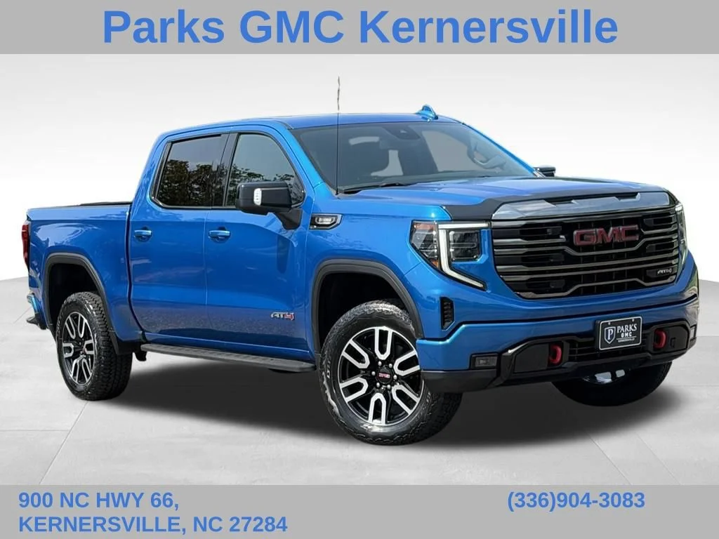 Used 2022 DYNAMIC BLUE METALLIC GMC AT4 image 1