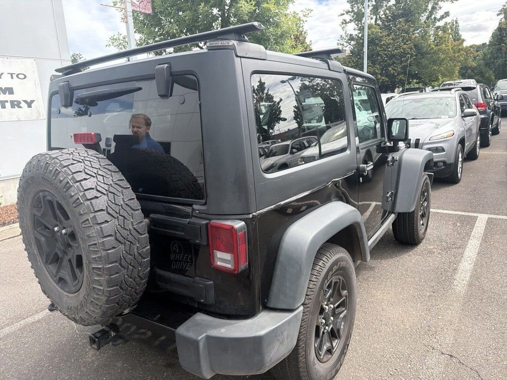 Used 2016 Black Clearcoat Jeep Sport image 3