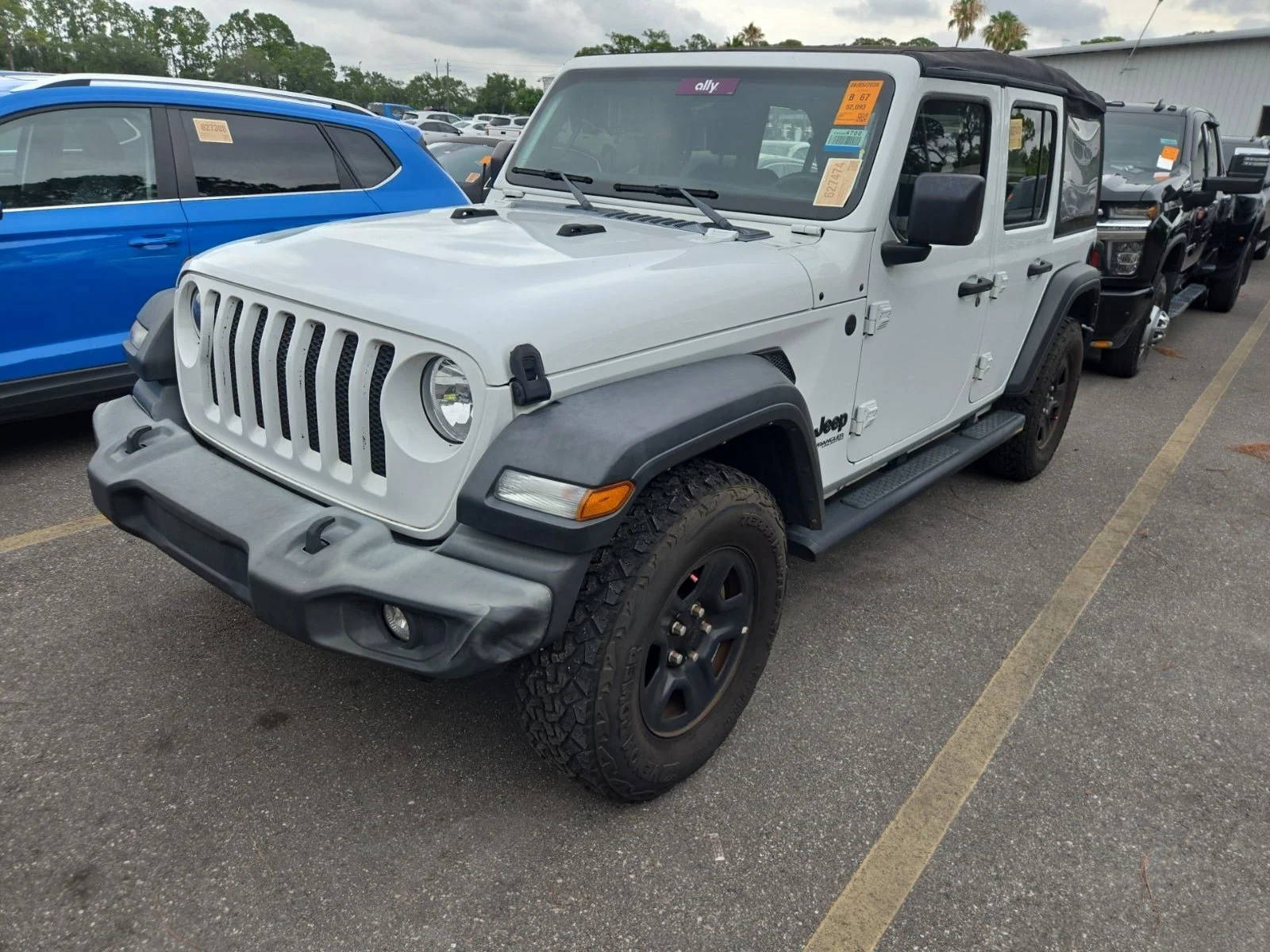 Used 2022 Bright White Clearcoat Jeep Unlimited Sport image 2