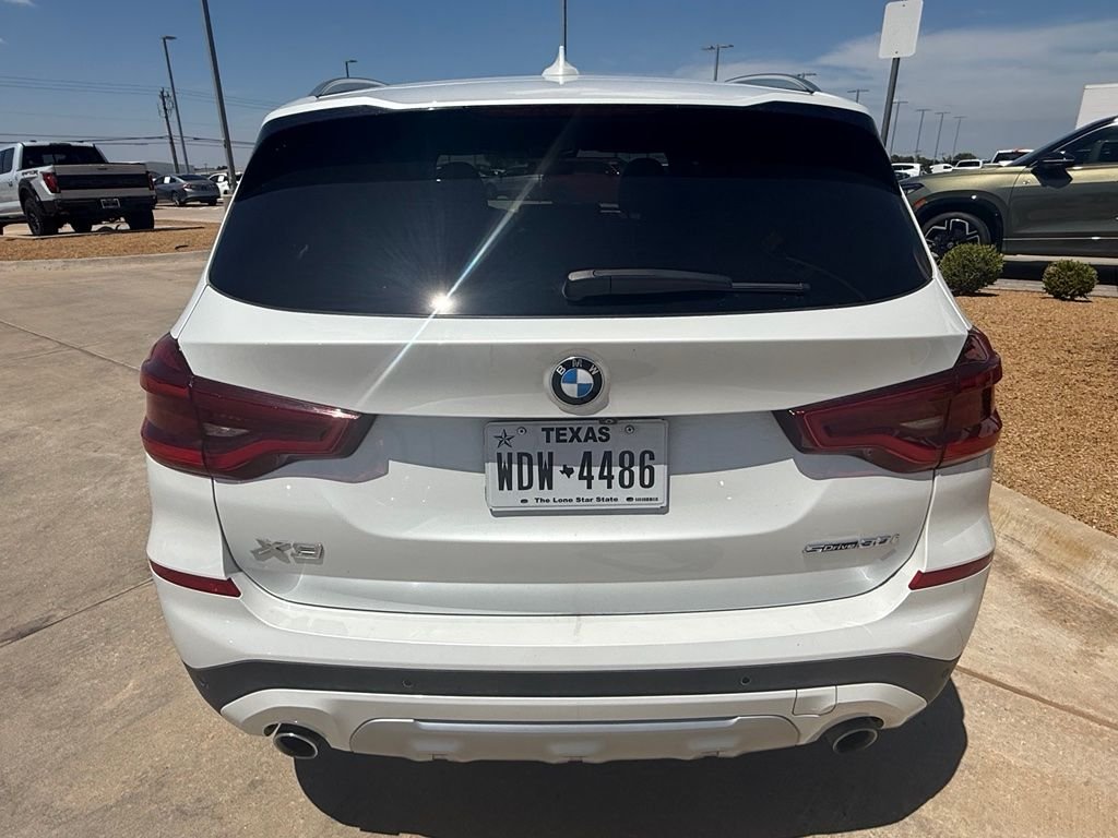 Used 2021 White Metallic BMW sDrive30i image 4