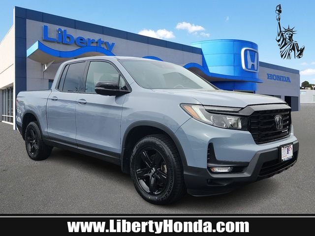 Certified Used 2023 Sonic Gray Pearl Honda AWD BLACK EDITION image 1