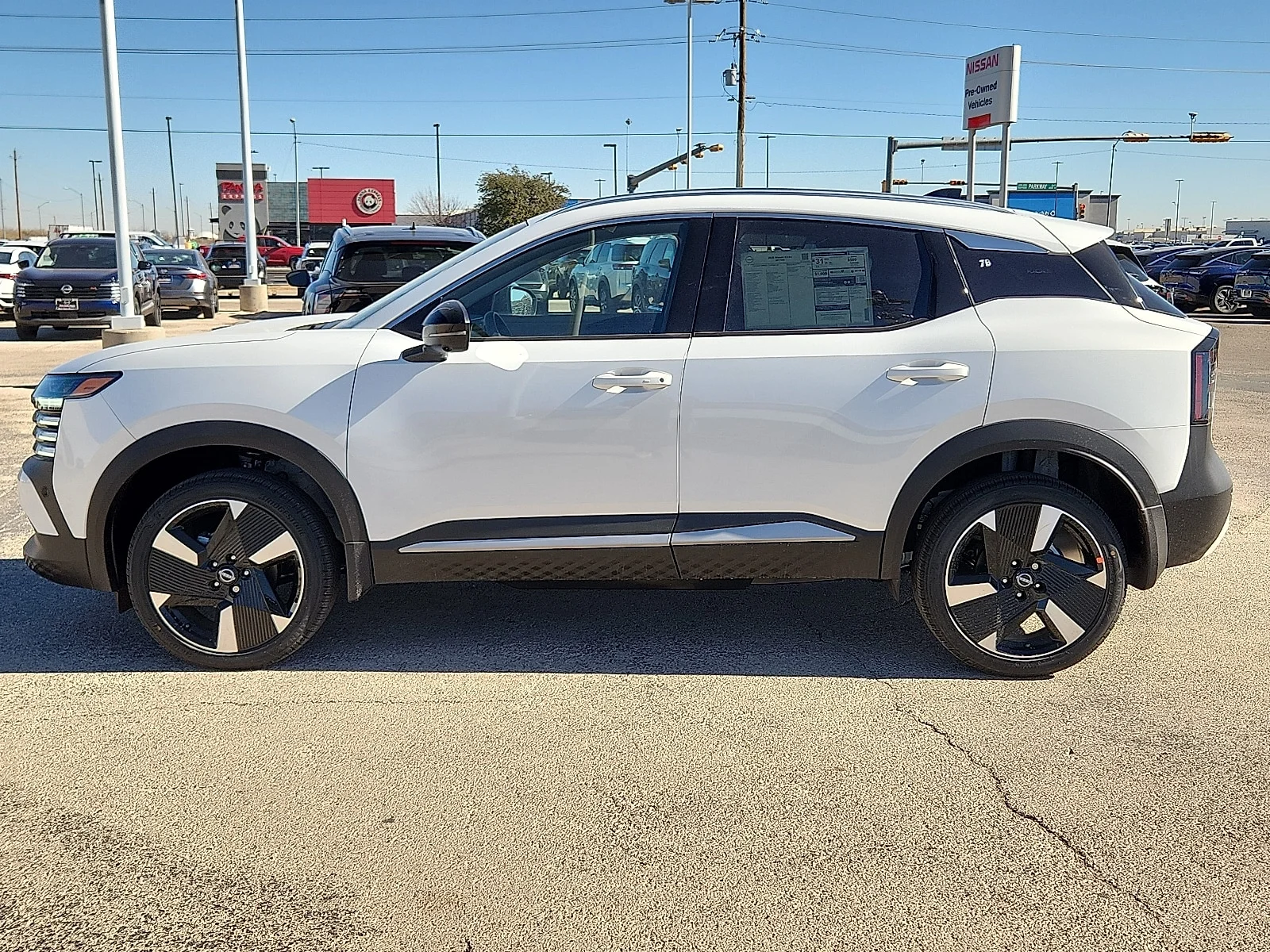New 2026 QAC Aspen Whit Nissan SR Front-Wheel Drive image 2