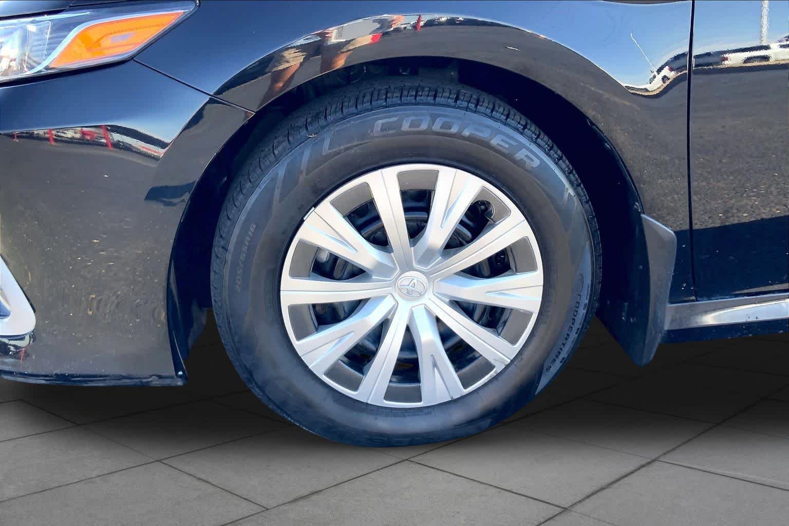 Used 2023 Midnight Black Metallic Toyota Hybrid LE image 11