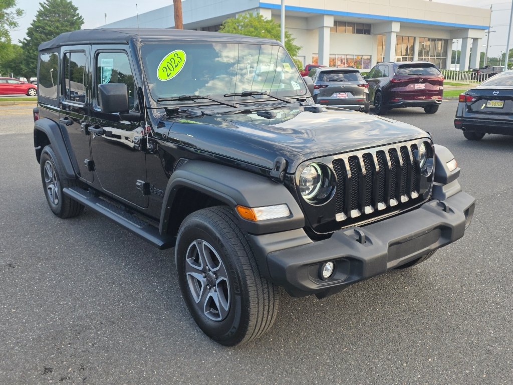 Used 2023 Black Clear Coat Jeep Sport S image 9