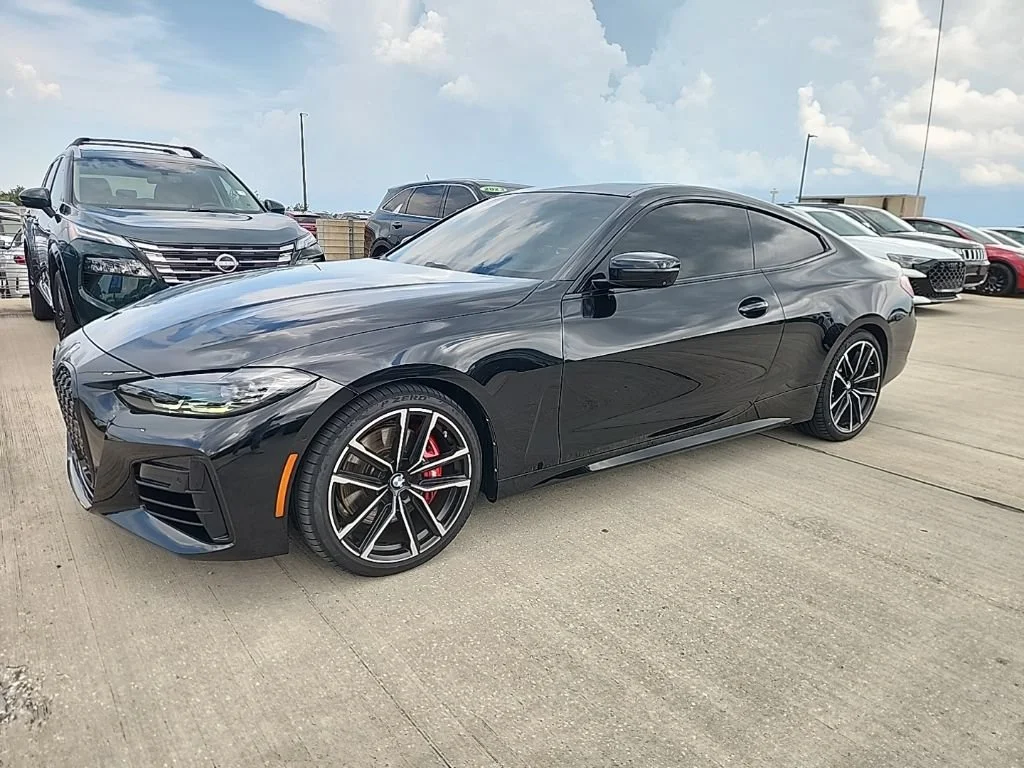 Certified Used 2024 Black Sapphire Metallic BMW M440i image 1