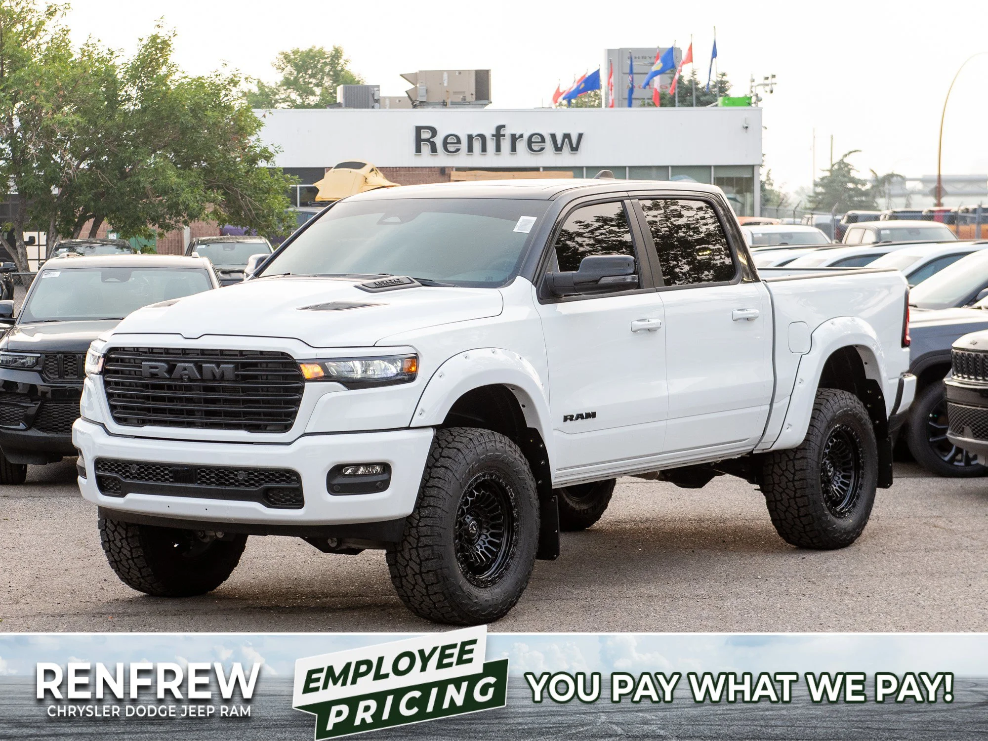 New 2026 White RAM Sport*, 6 Inch Lift, 37 Inch Tires, Trigger Industries Mudflaps image 1