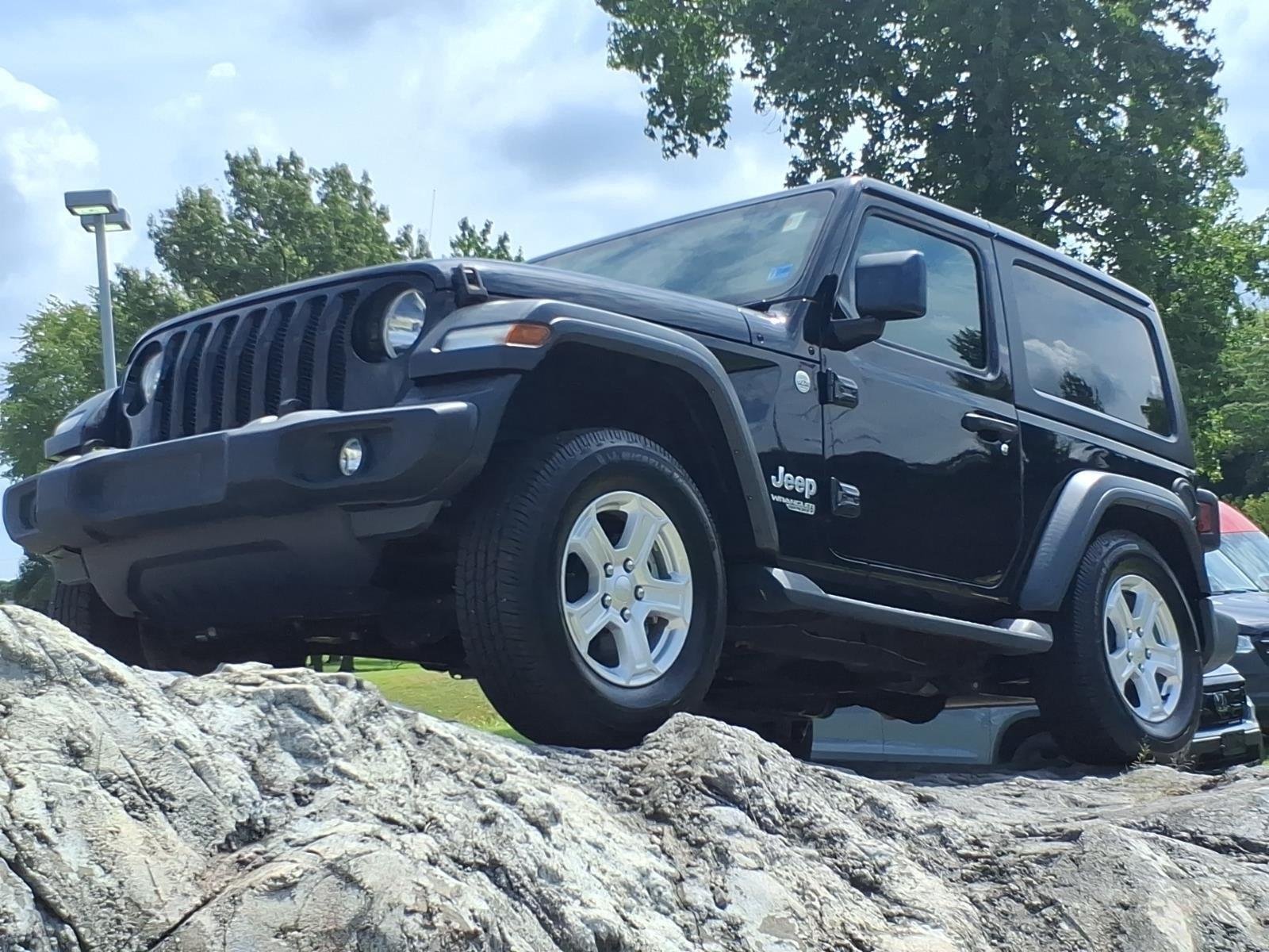 Used 2018 Black Clearcoat Jeep Sport S image 1
