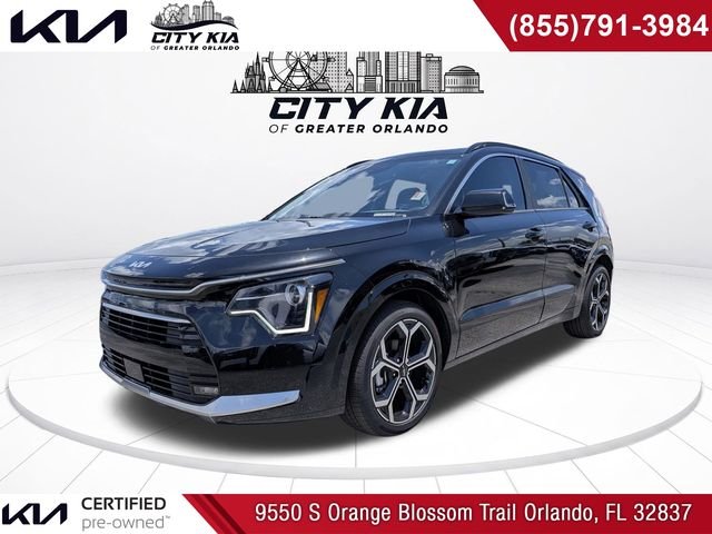 Used 2025 Black Kia EX Touring image 1