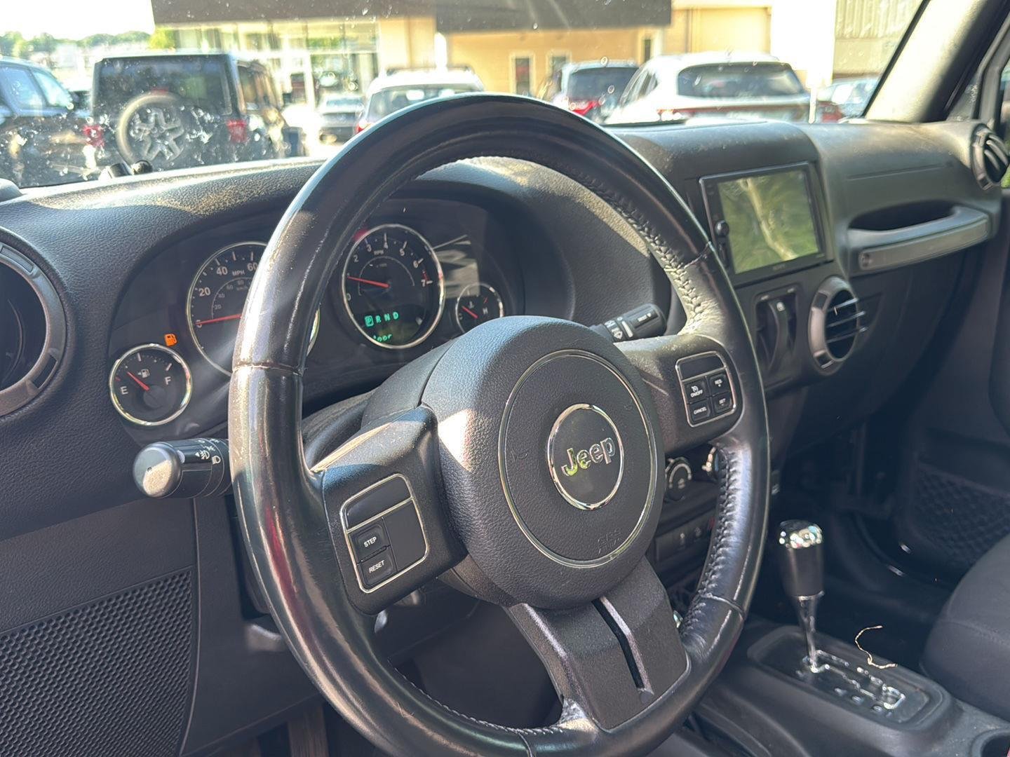 Used 2016 Black Clearcoat Jeep Sport image 13