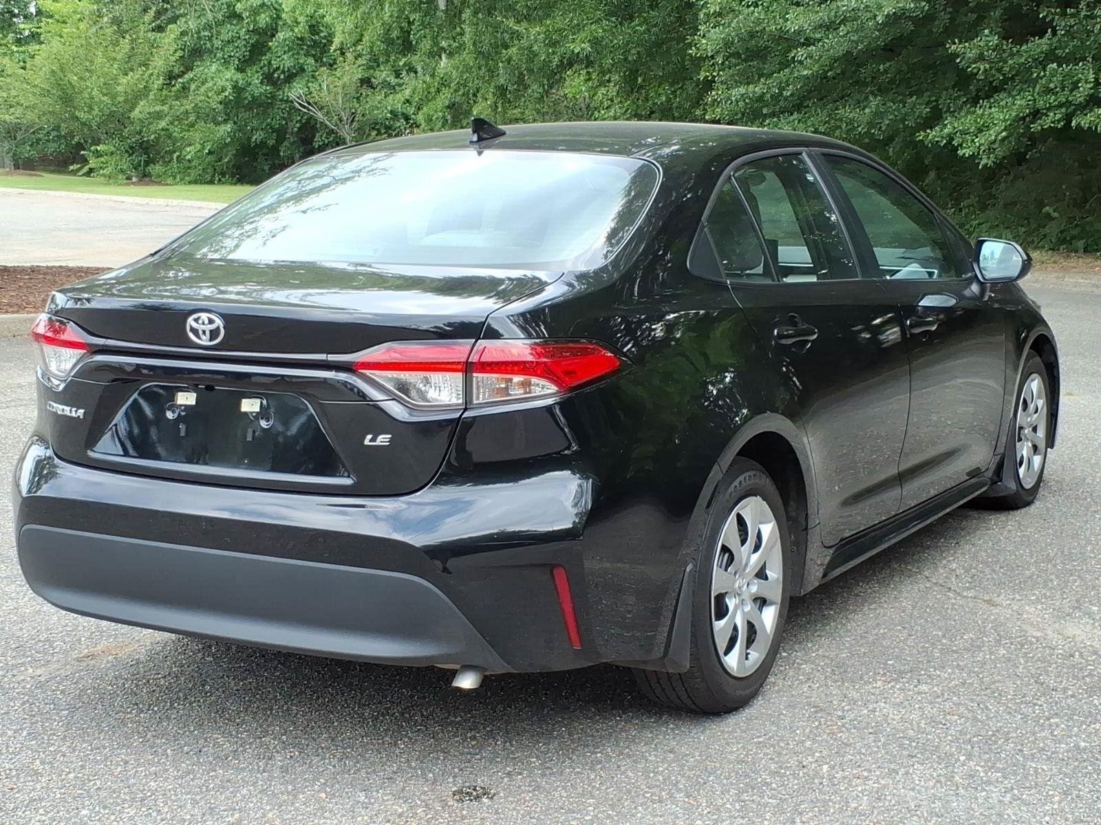 Used 2025 Midnight Black Metallic Toyota LE image 11
