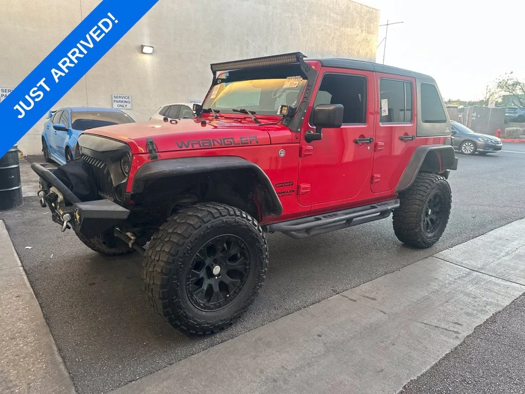 Used 2017 Red Clearcoat Jeep Unlimited Sport image 1