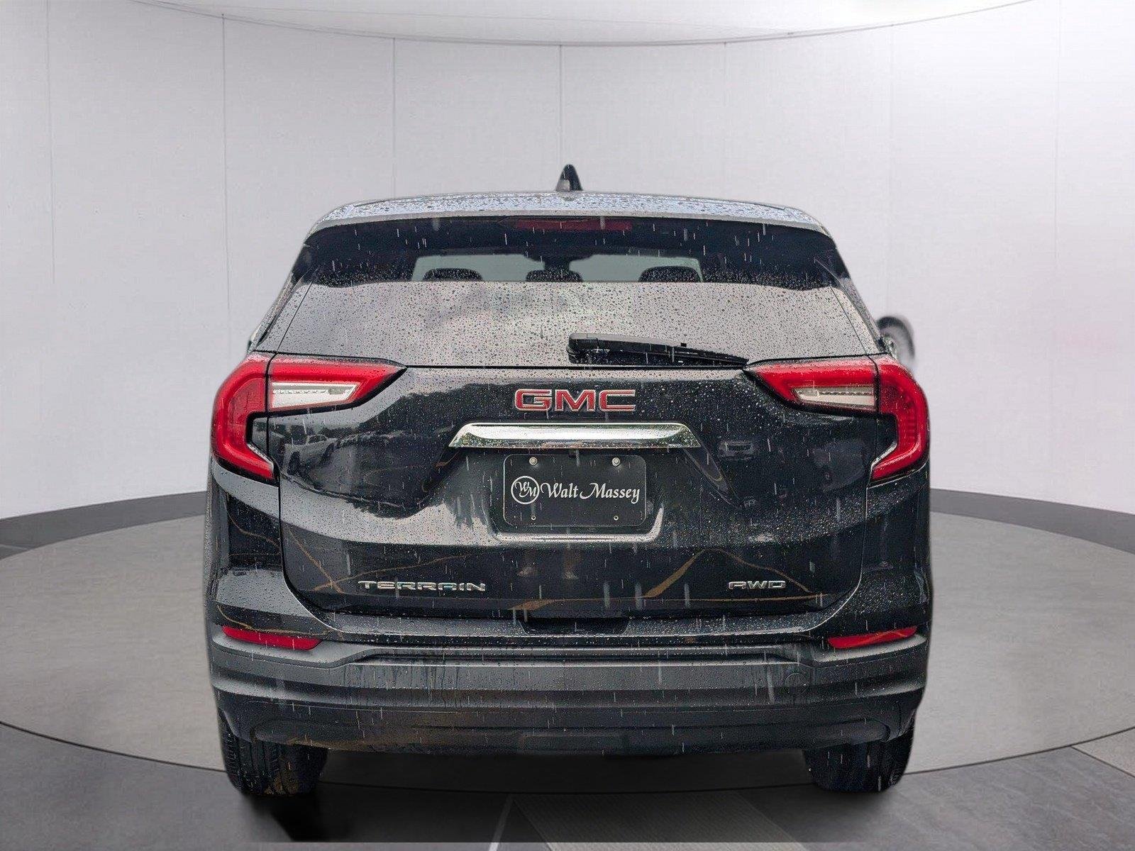 Used 2024 Ebony Twilight Metallic GMC SLE image 4